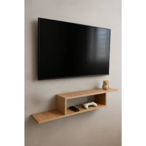 Meuble TV suspendu pour salon, installé sous un écran plat et contenant une manette de jeu et une télécommande.