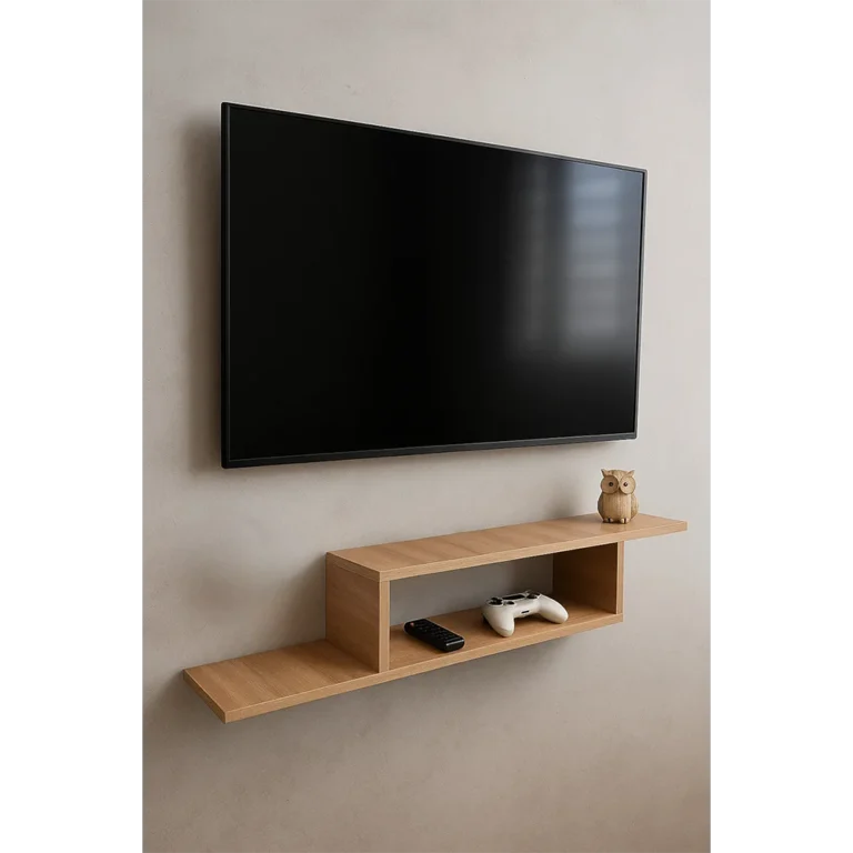 Meuble TV suspendu pour salon, installé sous un écran plat et contenant une manette de jeu et une télécommande.