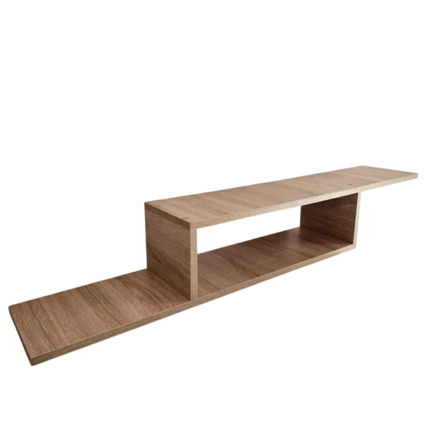 Vue en perspective du meuble TV suspendu vide, montrant son design asymétrique en bois clair sur fond transparent.