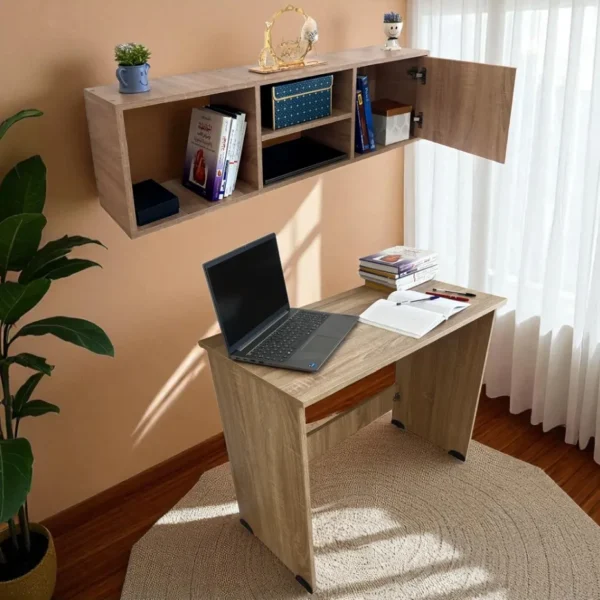 Un bureau démontable en bois clair sous une bibliothèque murale assortie, avec la porte du placard ouverte, dans un espace de travail.