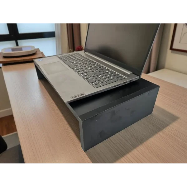 Support d'écran ergonomique noir, un accessoire de bureau essentiel anti-douleur cervicale.